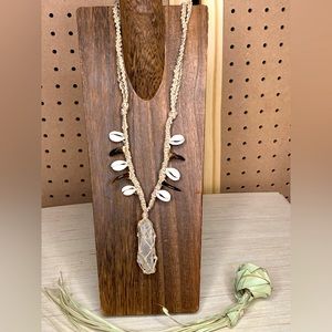 Hemp, quartz, cowrie shells, and wolf fang necklace